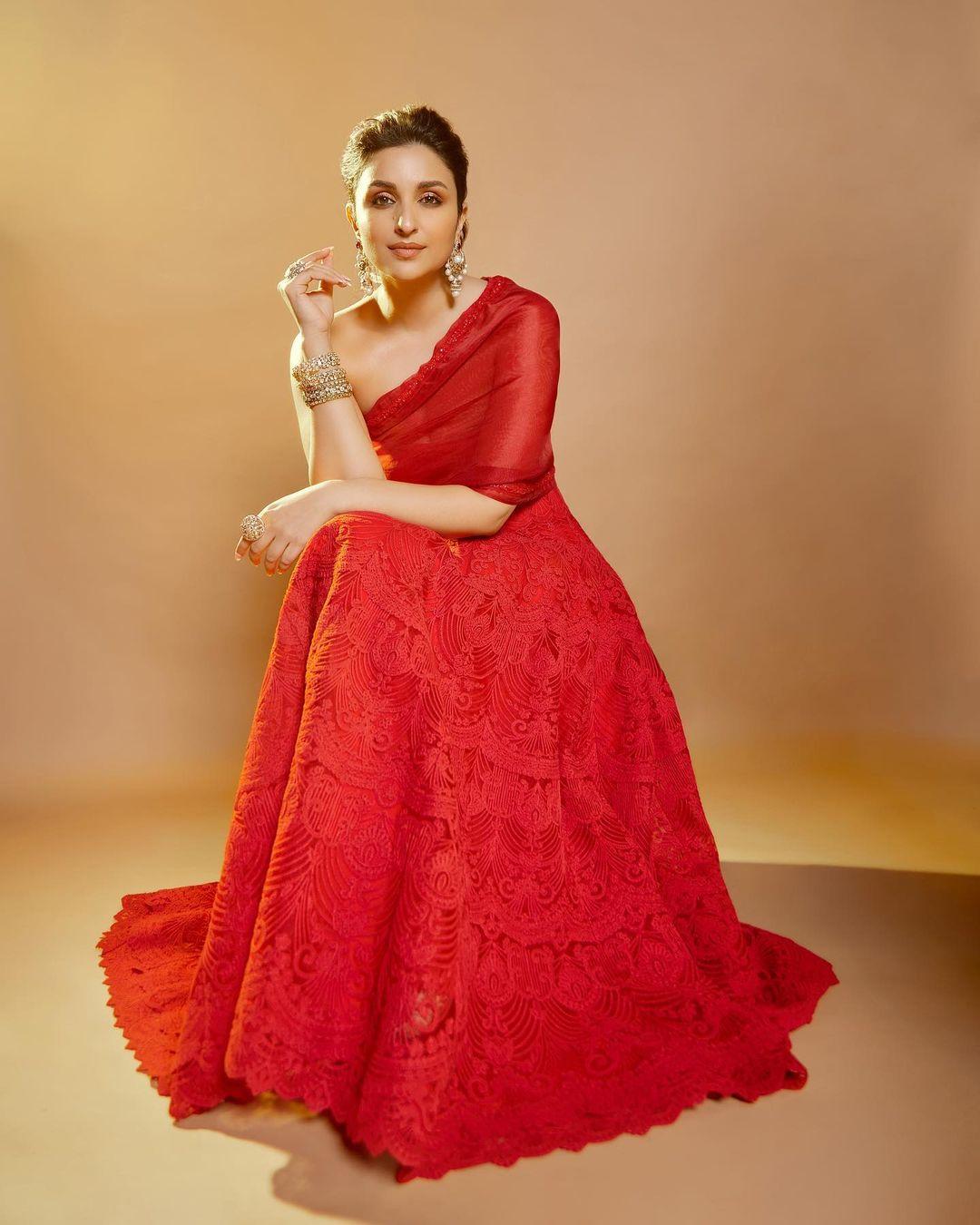 She styled her hair in a chic bun and accessorized with intricate traditional earrings to look stunning