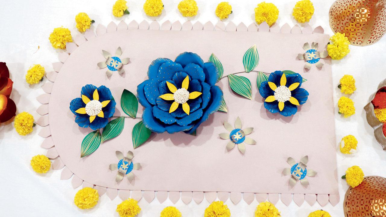 This paper rangoli created by paper florist Uurmi Bhatia can be made using a few sheets of chart paper, as a twist on the traditional chalk rangoli. Pics/Anurag Ahire