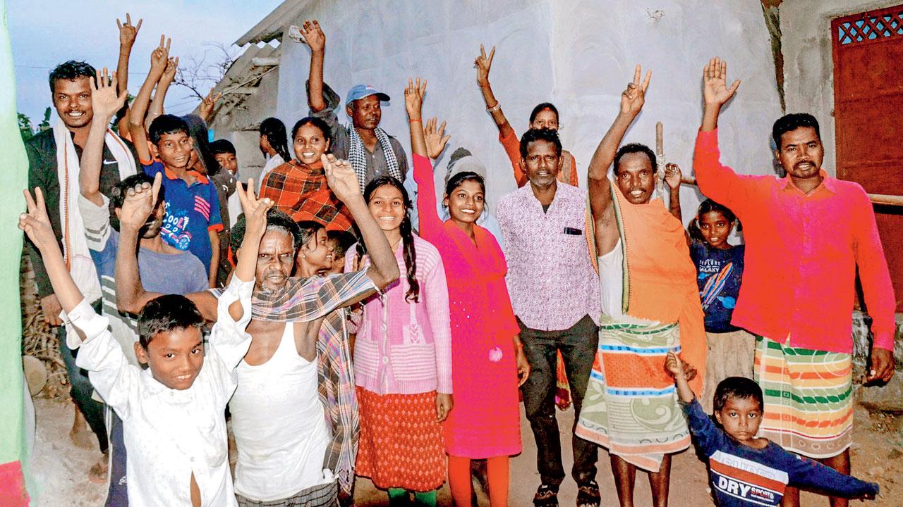 Relatives and family members of workers Sukhram Bediya, Naresh Bediya, Rajendra Bediya and Anil Bediya celebrate after their evacuation. Pic/PTI