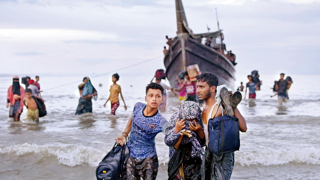 At least 240 Rohingya refugees afloat off Indonesia