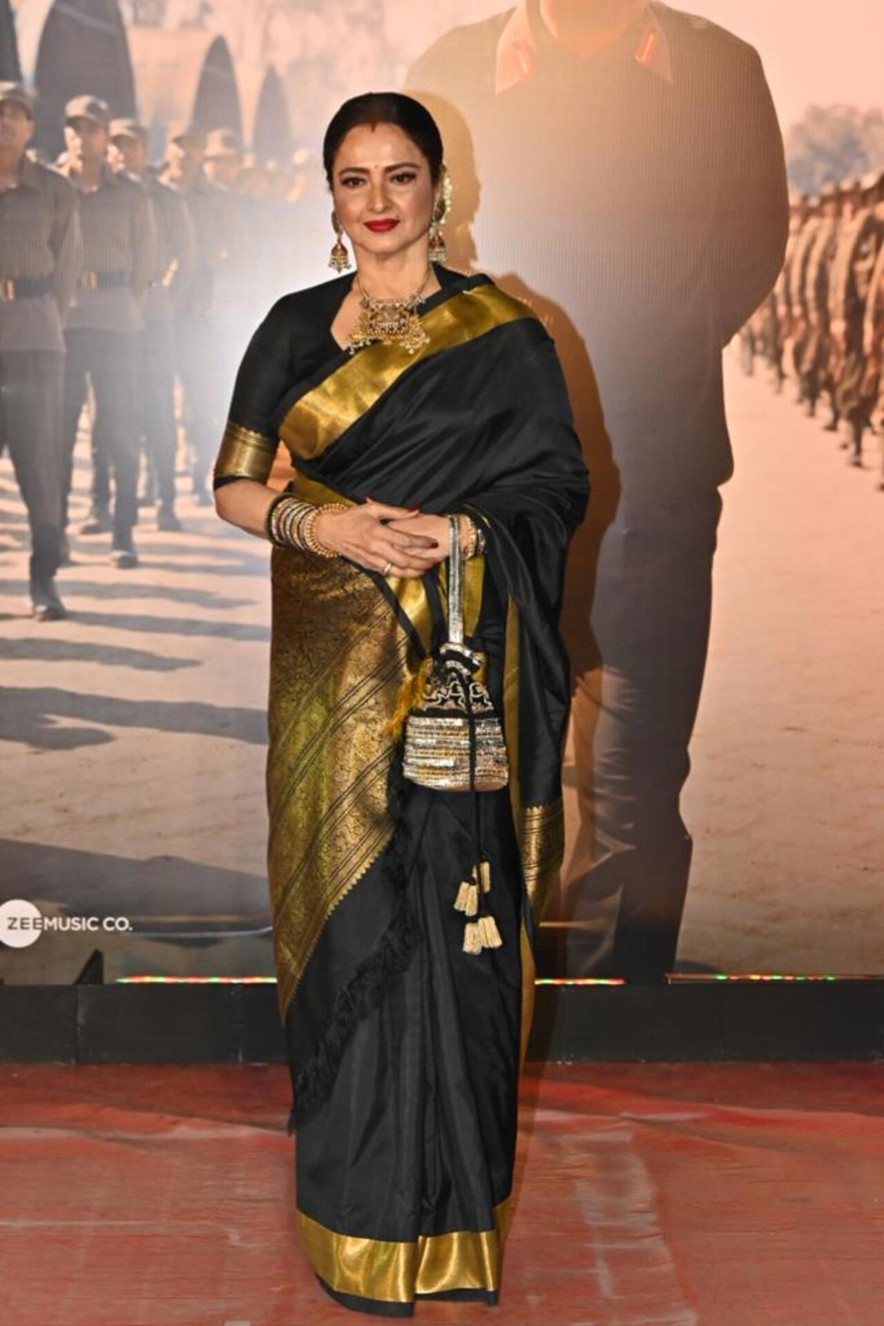 Rekha painted a royal picture in a black and gold silk saree