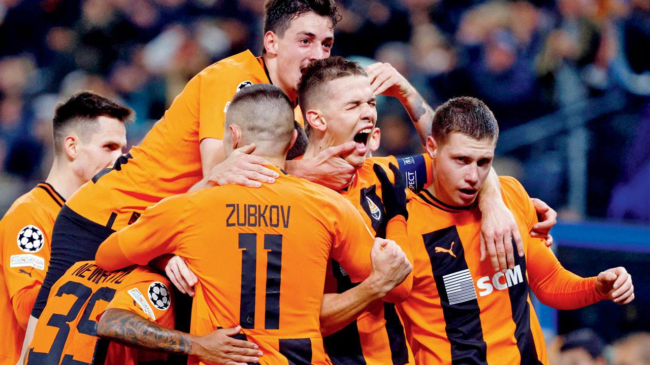 Shakhtar Donetsk’s Danylo Sikan (second from right) celebrates his goal v Barcelona with teammates in Hamburg on Tuesday. Pic/AFP