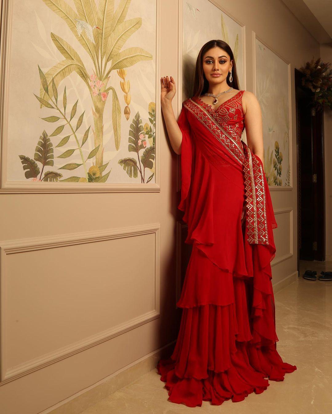Wearing red at a wedding can be the best choice you can make. Take notes from Shefali and ace your look in a pretty red saree