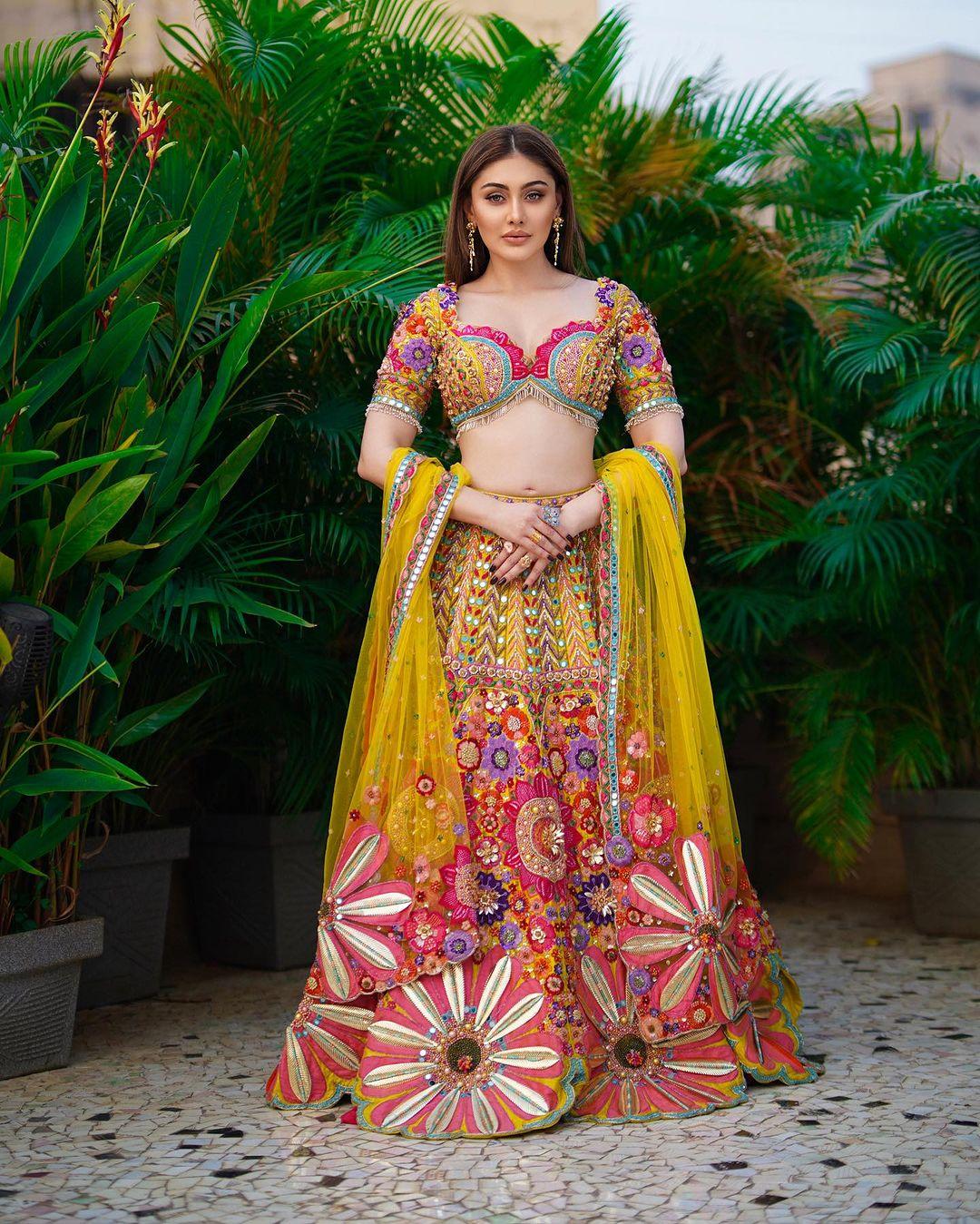 Go ace your haldi look with Shefali's stunning multicoloured lehenga.  This outfit, inspired by the actress, will make you look absolutely gorgeous at the family function