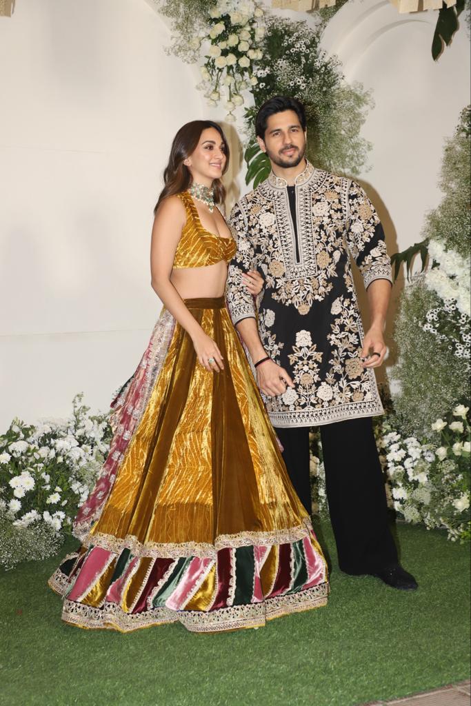 Lovebirds Sidharth Malhotra and Kiara Advani made a stylish entry. The actress wore a gorgeous multi-colour lehenga set and accessorized with heavy jewellery, leaving her hair open. On the other hand, Sidharth complemented his wife's look and donned a black floral sherwani