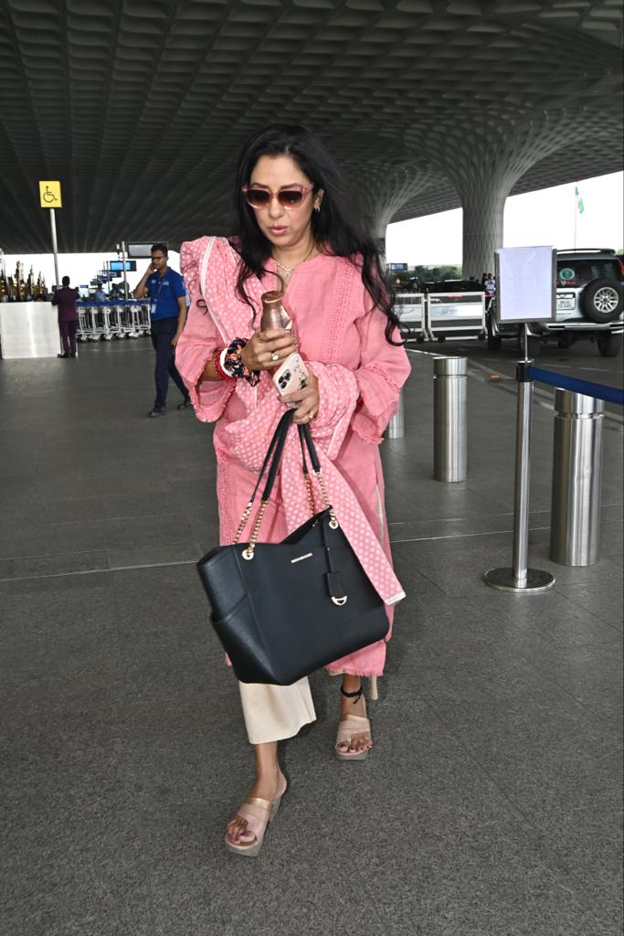 Rupali Ganguly looks super cute in a pink suit as she jets off