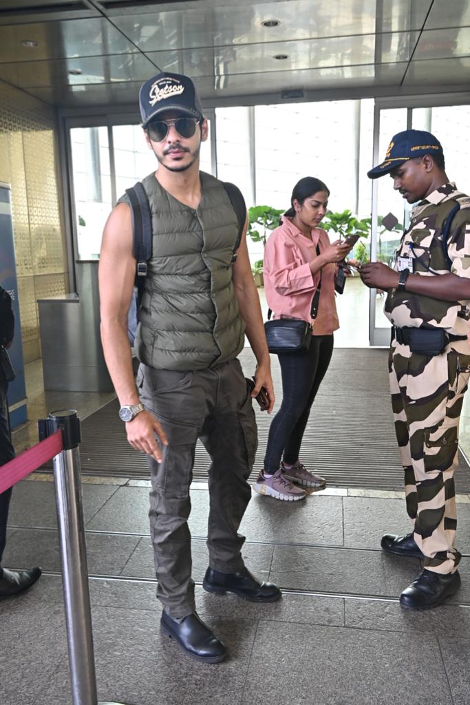 Ishaan Khattar posed for the paparazzi at the airport