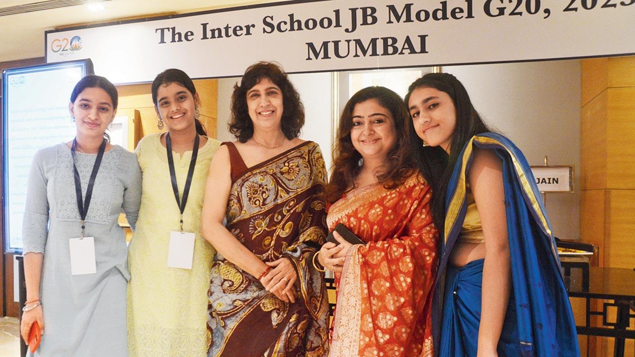 Principal of JB Petit High School for Girls Benaifer Kutar (centre) with participants of the Model G20 conducted at the Taj President