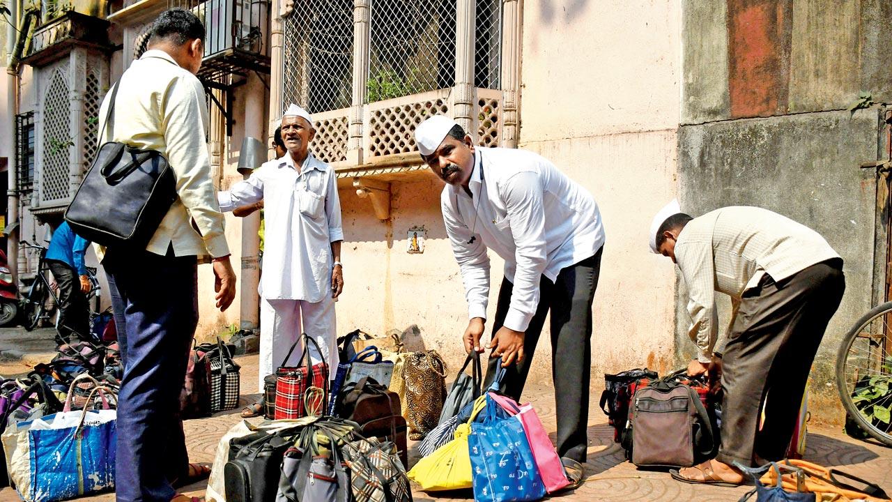 Dabbawalas at the Swaminarayan Mandir in Dadar. Pic/Ashish Raje