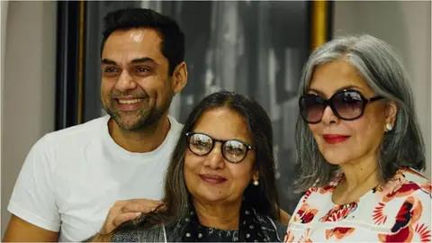 Manish Malhotra took to his social media handle to share a picture of Zeenat Aman, Shabana Azmi, and Abhay Deol posing together. They will be working together in the film Bun Tikki. Read More