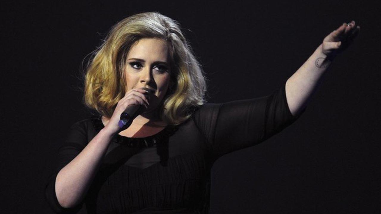 Adele flashes wedding ring at basketball game with husband Rich Paul