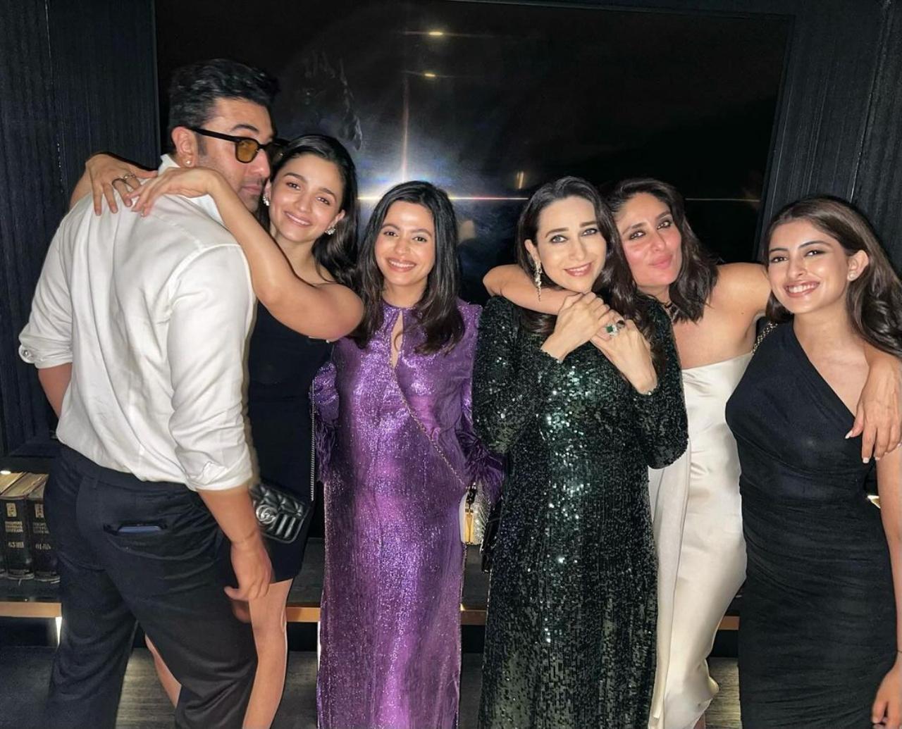 The Kapoors spend some family time at the SRK bash. Ranbir Kapoor and Alia make a ht pair as they pose with Shaheen Bhatt, Kareena and Karisma Kapoor, and Navya Nanda