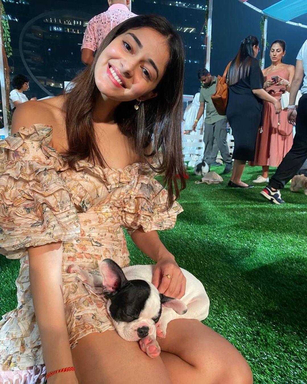 Ananya Panday graced a noteworthy birthday bash donning the Zimmermann painted heart folds mini dress adorned with vibrant spring hues. This delightful attire, crafted from a blend of silk and linen organza, she accentuated with dainty droplet earrings.