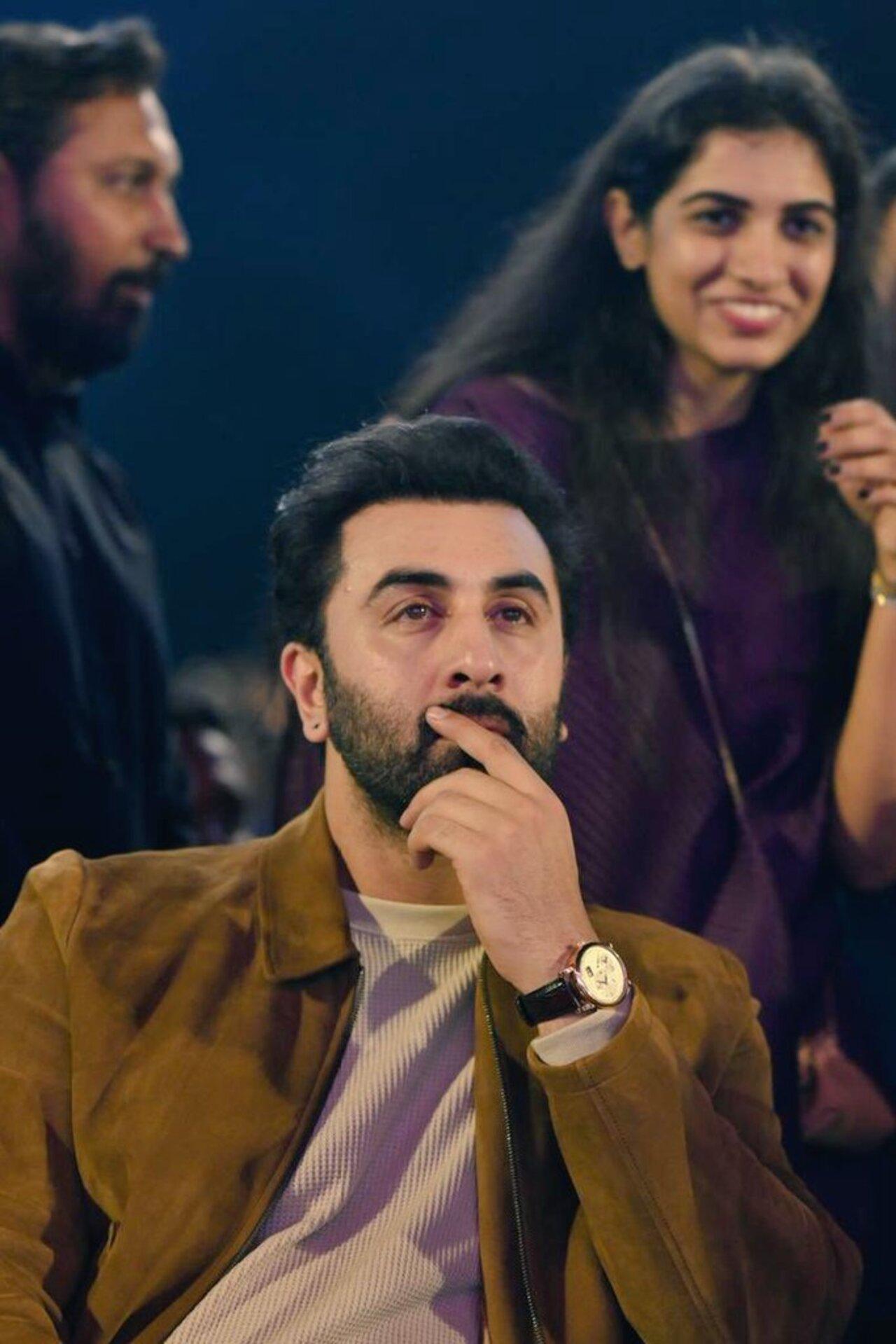 Ranbir Kapoor wore a brown jacket for the event. He was seen chatting away with Mahesh Babu while seated in the audience. He later showered praise on the people present at the event. He was also seen touching Rajamouli's feet on the filmmaker's arrival