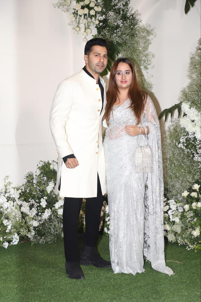 Varun Dhawan arrived with his wife Natasha Dalal. The much-in-love couple wore matching outfits - Natasha in a white tissue saree and Varun in a sherwani