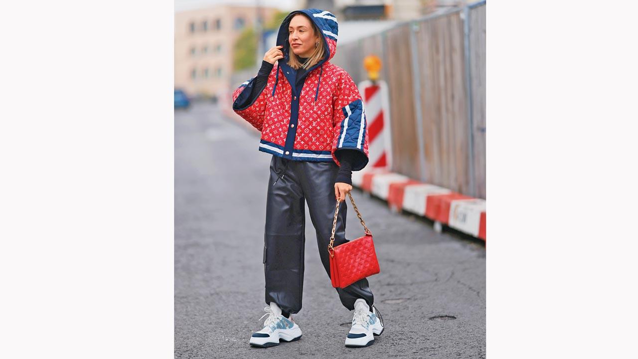 The influencer in a nylon print hooded short jacket. Pics Courtesy/Getty Images