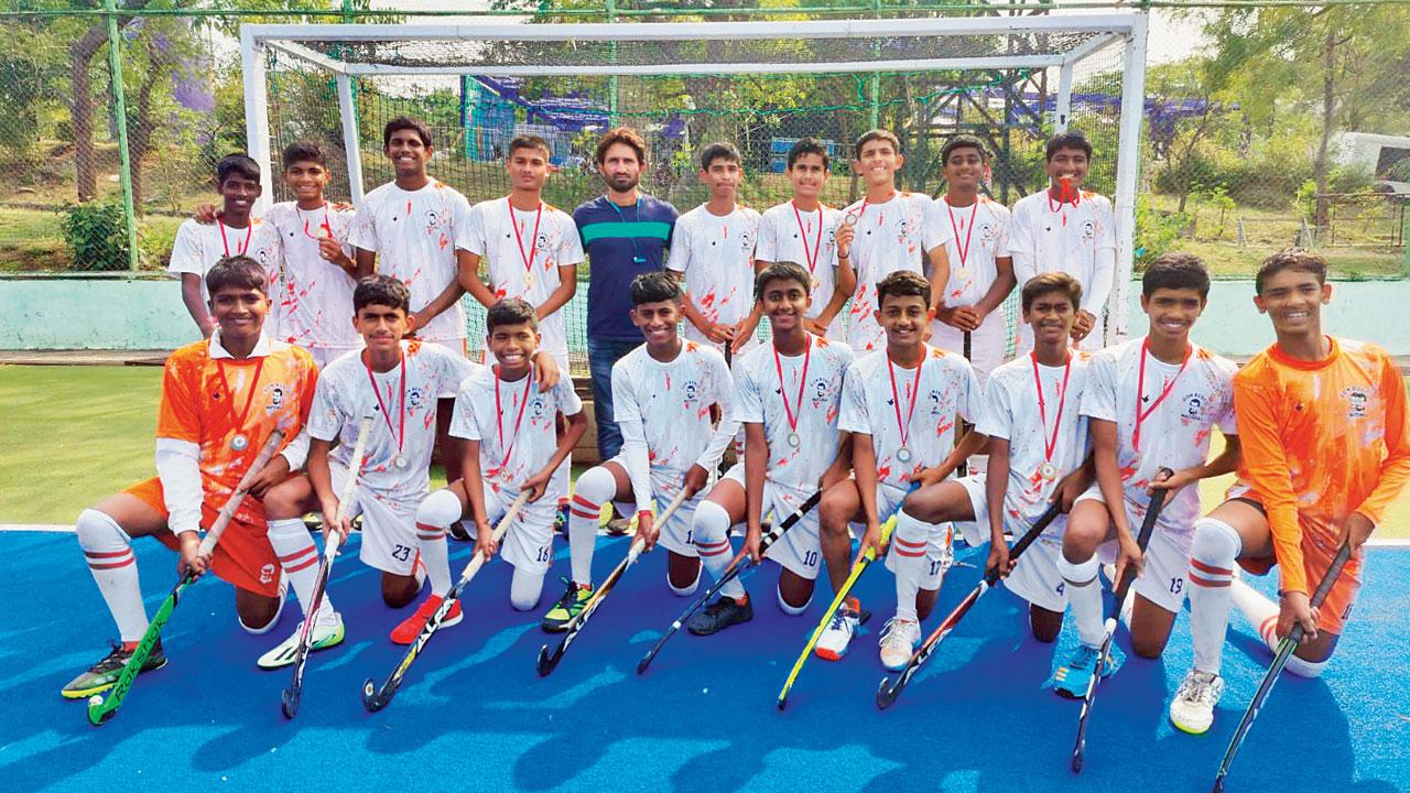 The Don Bosco High School (Matunga) U-17 side after winning state hockey titles in Pune recently