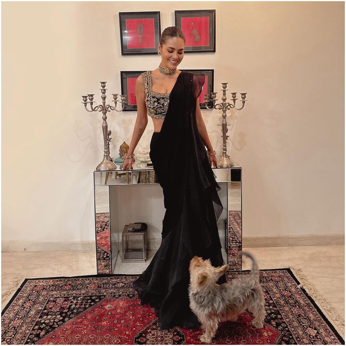 Esha opted for a black fusion outfit for her Diwali look, as she posed with her cute pet at home