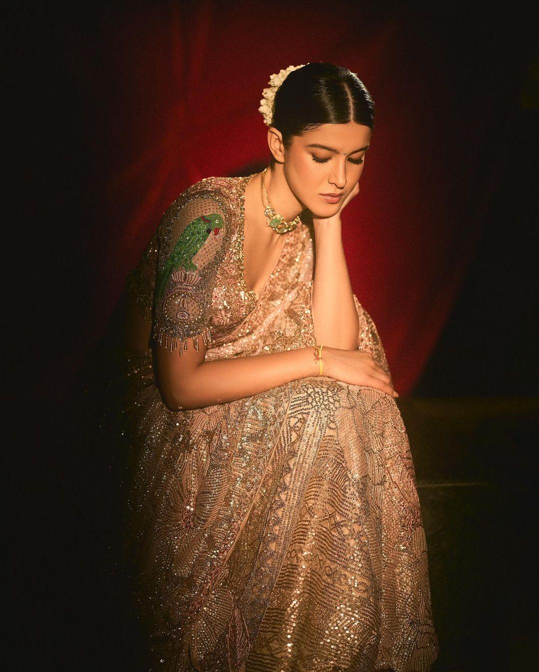 The actress tied her hair in a chic bun decorated with stunning gajra. This ensemble is an ideal choice for stealing the spotlight and making a statement as the perfect bridesmaid