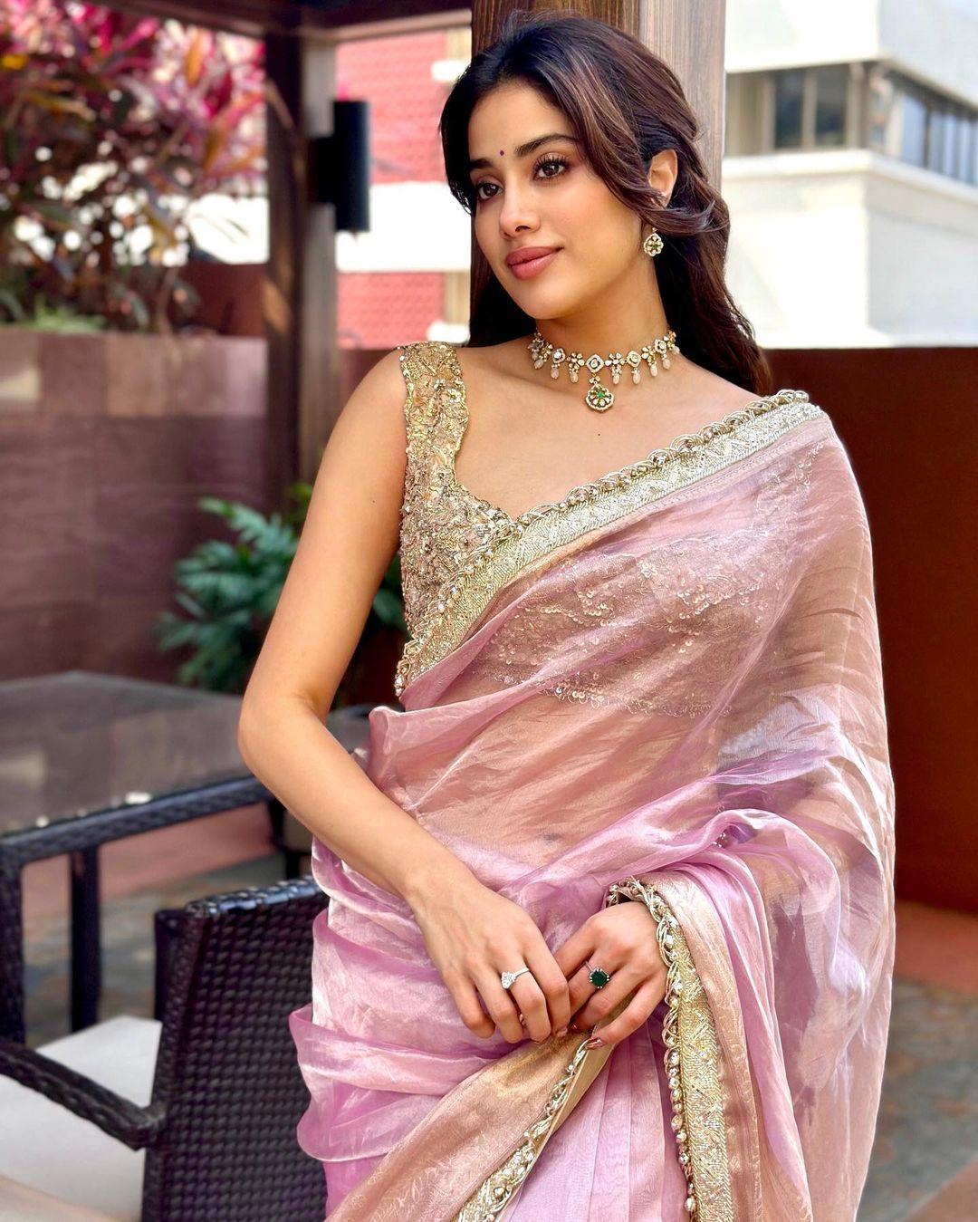 Janhvi Kapoor showcased the timeless elegance of a plain purple saree, proving its versatility as the perfect go-to for any occasion