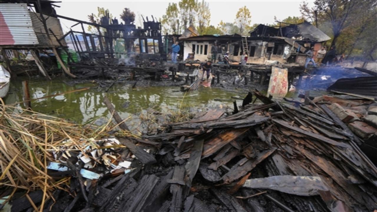 The tourists' bodies were retrieved from the debris of the gutted houseboats near ghat nine on the lake, a popular attraction for people visiting Jammu and Kashmir's summer capital