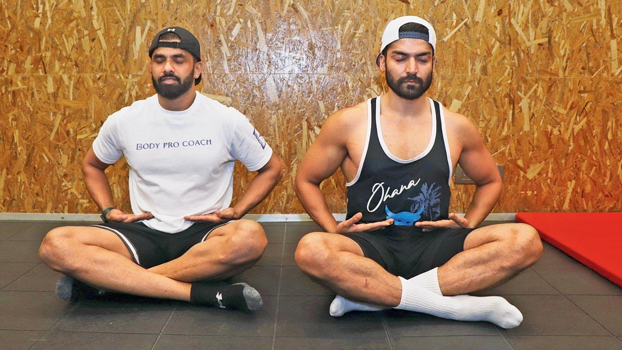 Trainers Praveen and Maahek Nair say that gratitude and mindfulness gives people the mental strength to overcome physical challenges. Pics/Anurag Ahire