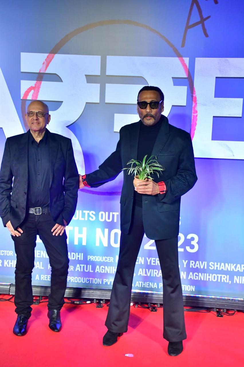 Jackie Shroff arrived at the venue with his trademark plant in his hand