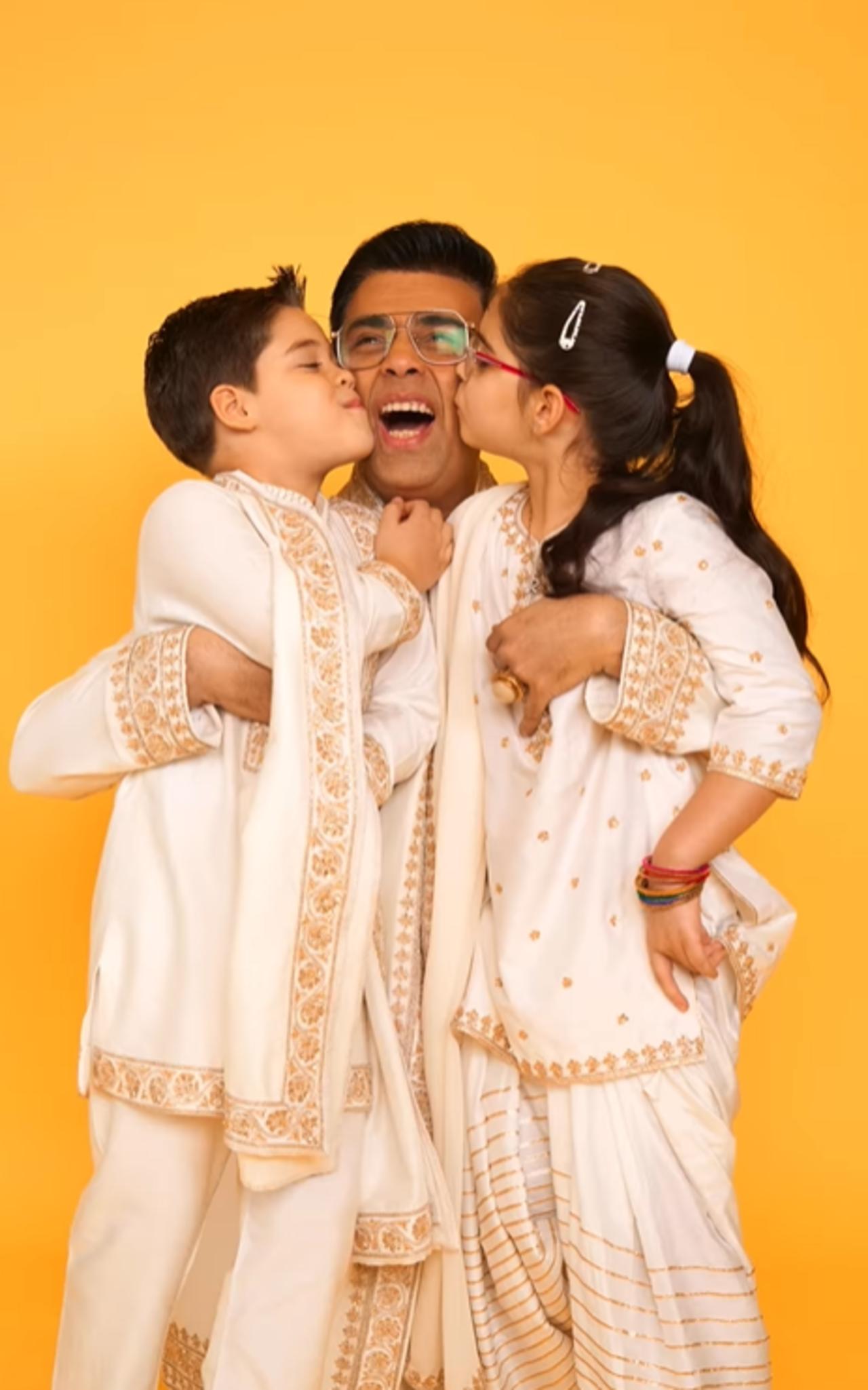 Karan Johar hosted a Dhanteras puja at Dharma Productions office today. He twinned with his children-Yash and Roohi in ivory