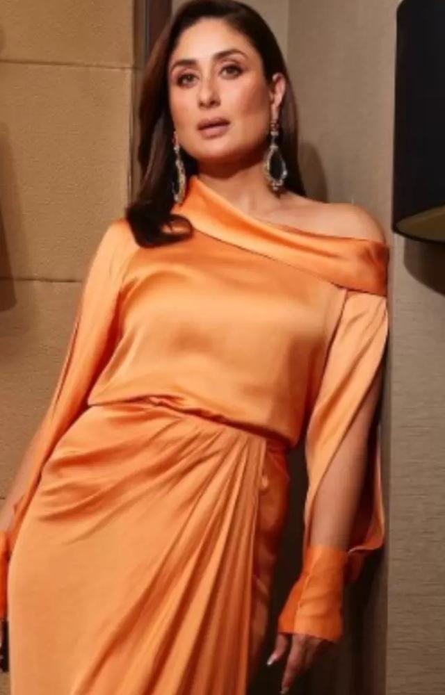 Kareena Kapoor knows how to make an entrance, and her satin gown with a one-shoulder neckline and pleated wrap style was no exception to her timeless elegance
