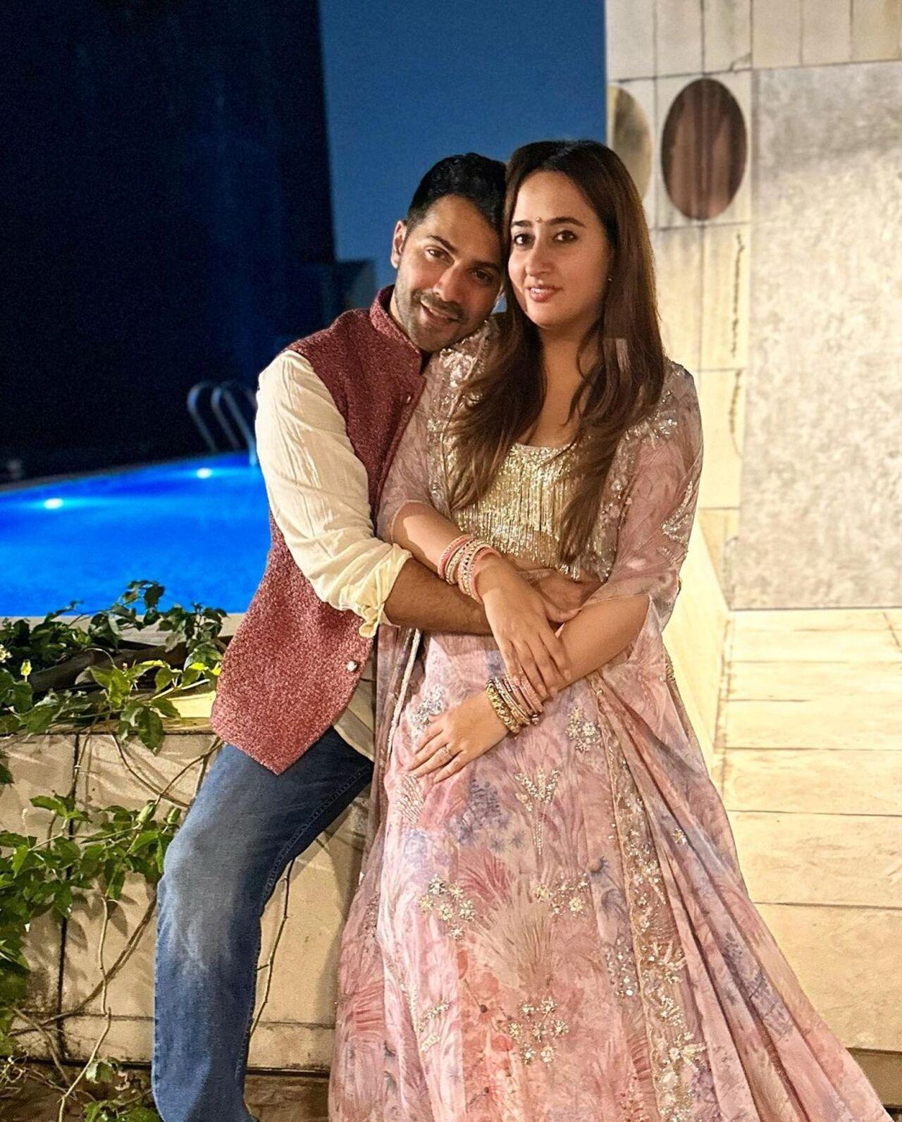 Varun Dhawan and Natasha Dalal pose together. The duo was also seen at Anil Kapoor's residence to celebrate the festival