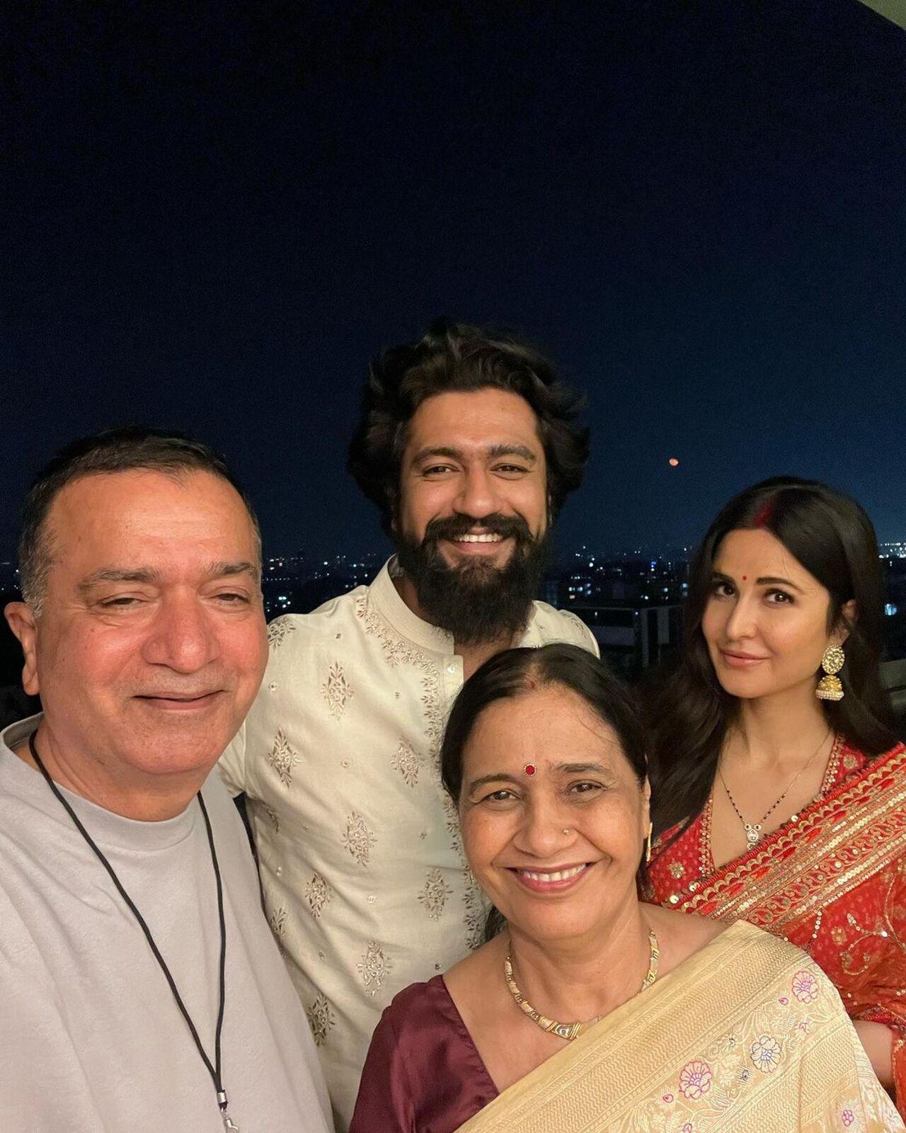Vicky and Katrina pose with the former's parents as they all celebrate the festival at their Mumbai home