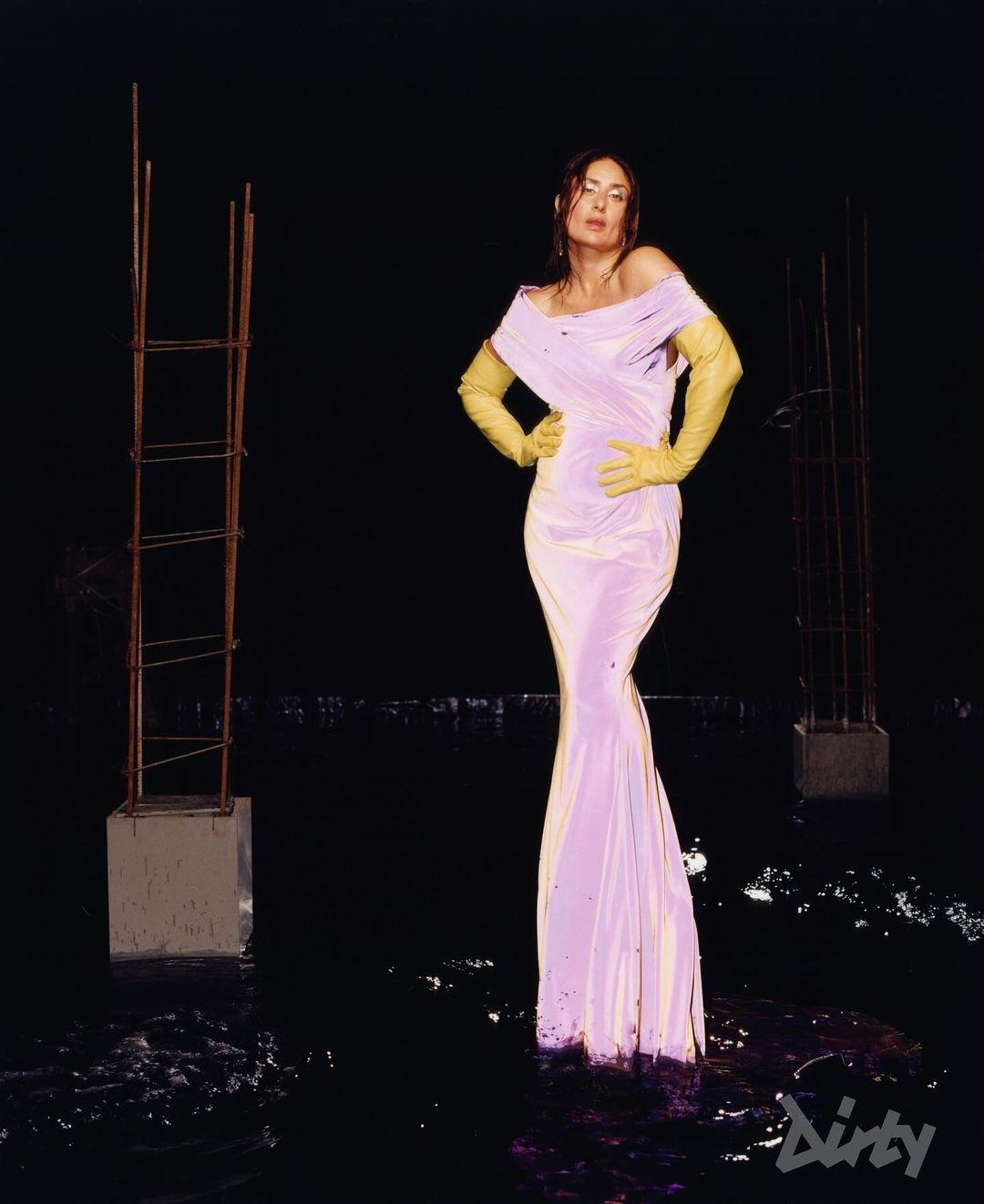 For a recent magazine cover shoot, Kareena was dressed in the finest clothes and jewels. In this picture, Kareena appeared stunning in a lavender gown that highlighted her well-toned figure. She accessorized the off-shoulder gown with gloves, earrings, unique makeup, and a tied hairstyle.