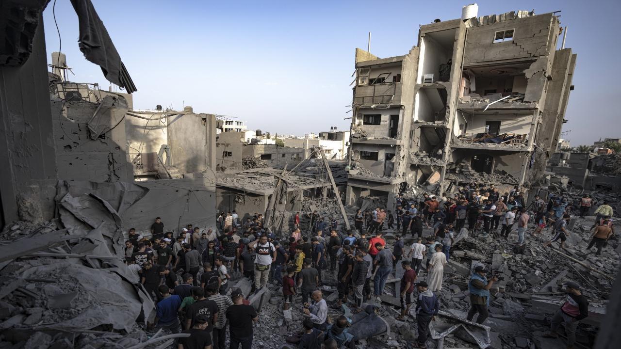 In Pics: Palestinians look for survivors as Israel bombards Khan Younis in Gaza