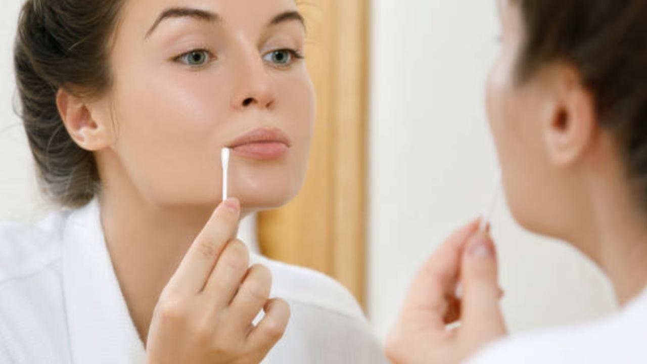 If you mess up the application, use a lip brush or a Q-tip with your concealer to work your way around the edges to clean up any excess, split colour or bleeding.
Photo Courtesy: iStock