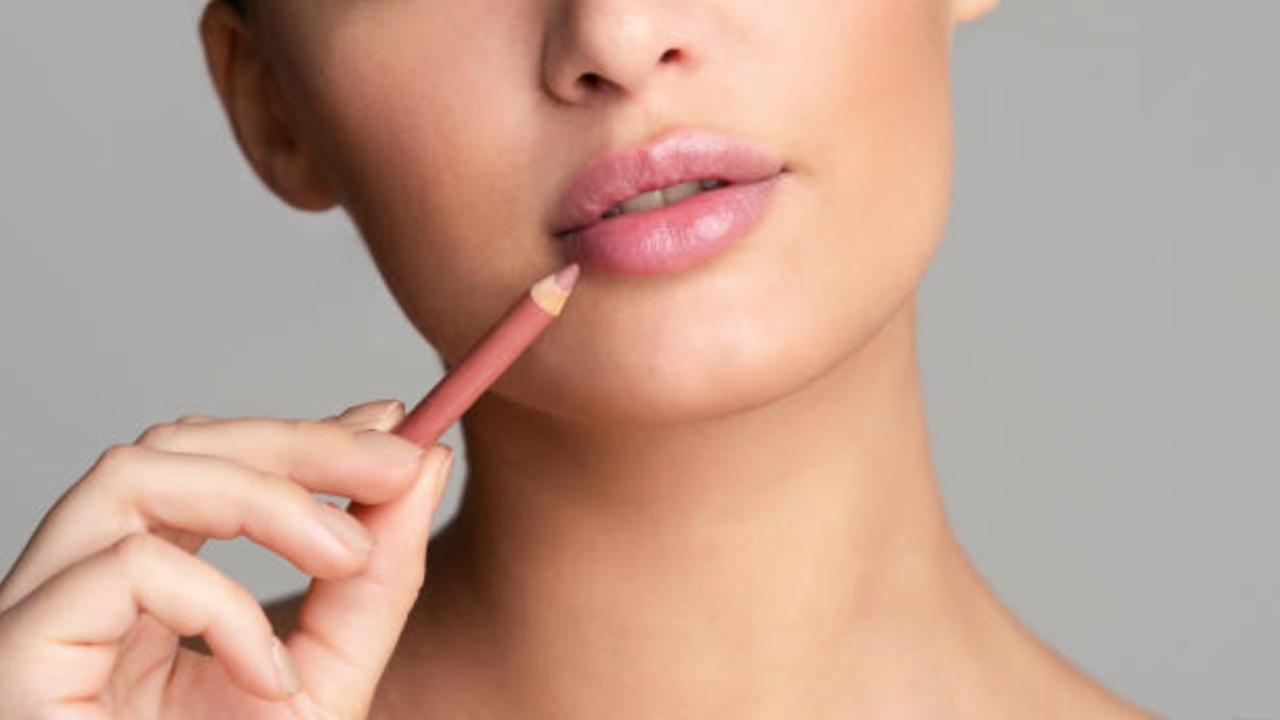 The key to applying lipstick perfectly is precision and control. Start by lining your lips with a lip liner that matches the shade of your lipstick. Outline your lips, emphasising the cupid's bow and defining the corners. This will create a crisp and polished lip shape. 