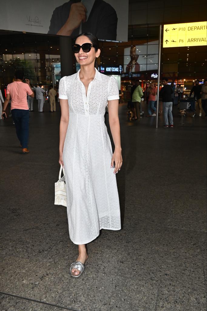 Manushi Chhillar looked ethereal at the airport today. She was seen in a flowing white dress