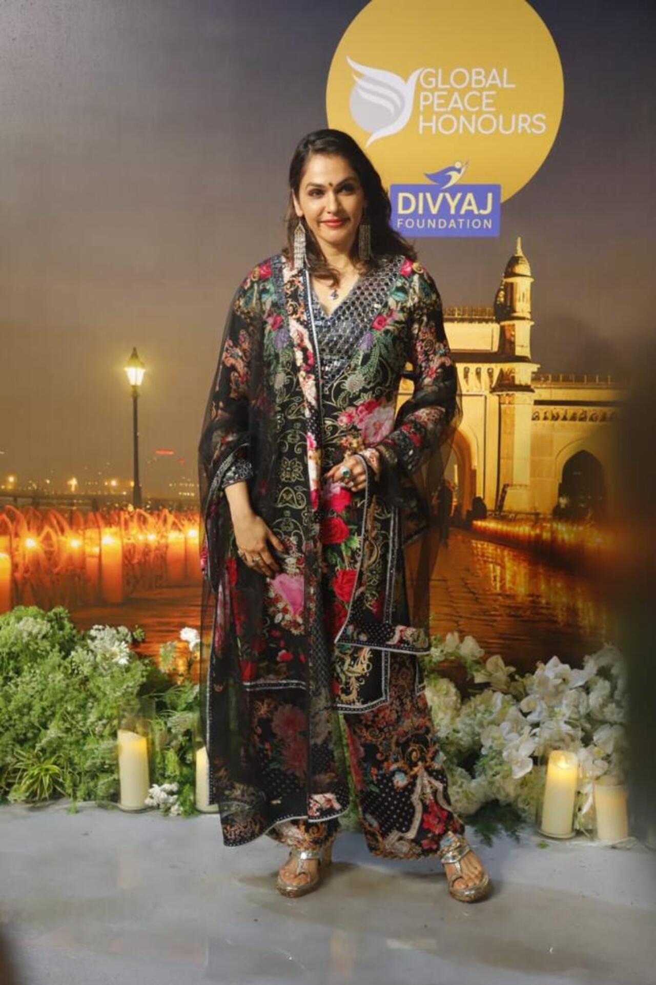 Isha Koppikar arrived for the event in a simple colourful printed anarkali suit