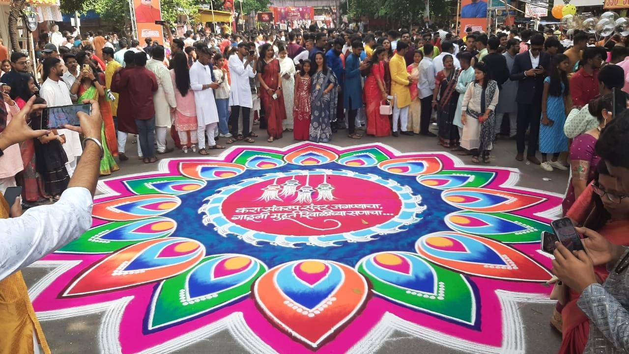 Local artists creates huge rangolis on the road to celebrate Diwali festival