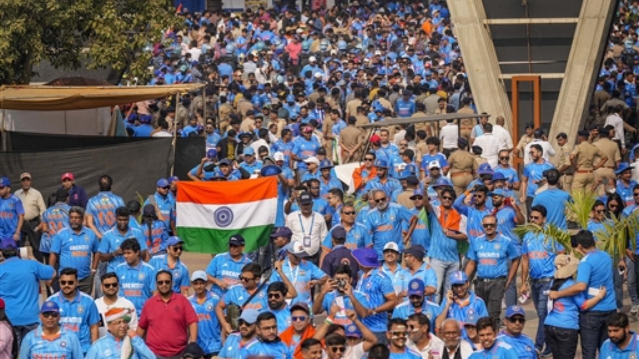 Fans arrive at the Narendra Modi Stadium to watch the ICC Men’s Cricket World Cup 2023 final between India and Australia, in Ahmedabad