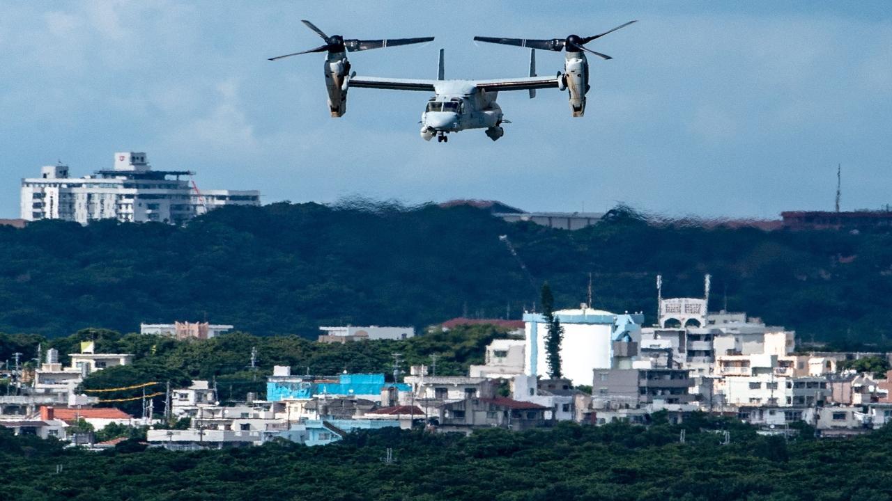 Japan's coast guard has found a person and debris in the ocean where a U.S. military Osprey aircraft carrying eight people crashed Wednesday off southern Japan