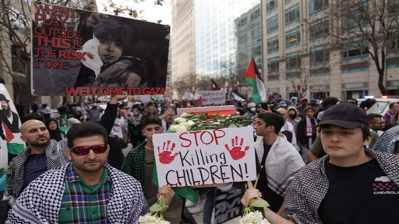 Thousands of protesters, many of them union members, including teachers and health care workers, filled Civic Center Plaza in front of City Hall in San Francisco. Many waved Palestinian flags and left mementos and flowers at an altar spread on the pavement to honor the thousands of Palestinians in Gaza who have been killed in the ongoing war.