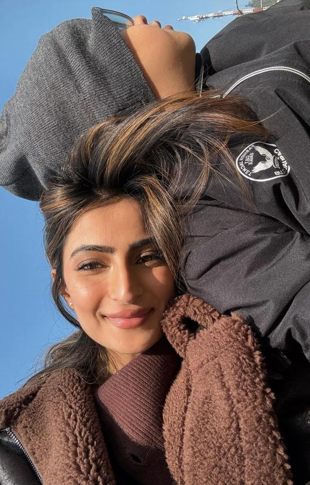 Palak wore a brown turtle neck with a fur jacket. That glow on her face as she posed with Reyansh cannot be missed
