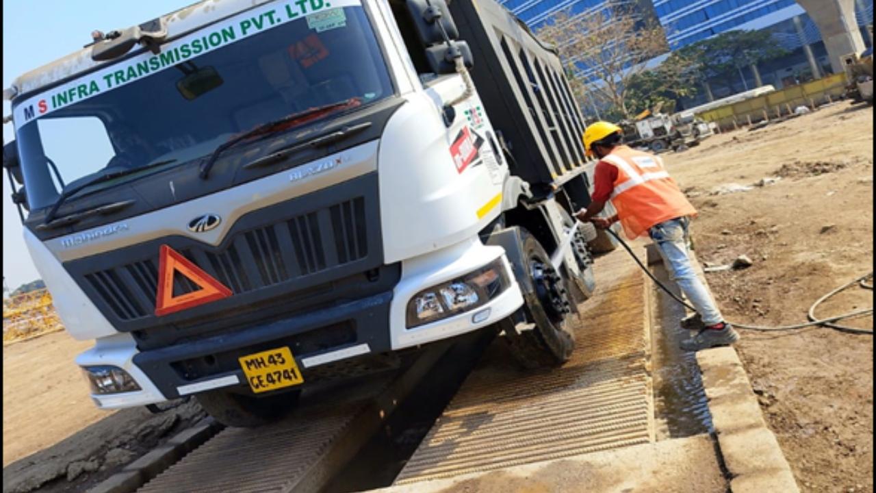 A wheel wash facility is provided at site, which cleans the wheels of the vehicles, thereby avoiding the vehicles to carry dust through their tyres/wheels in and out of the site, the official said