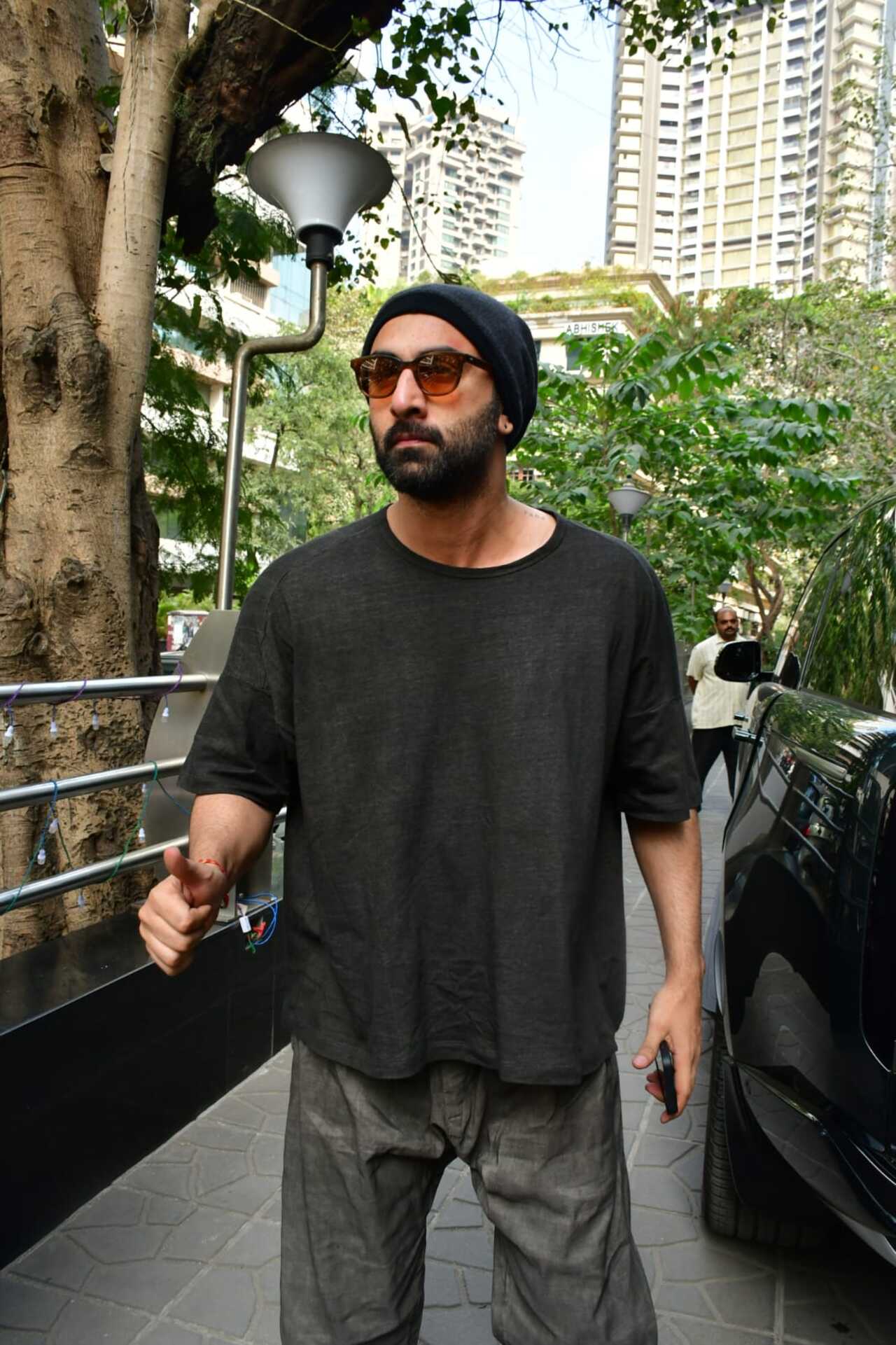 He wore an oversized black T-shirt and pants