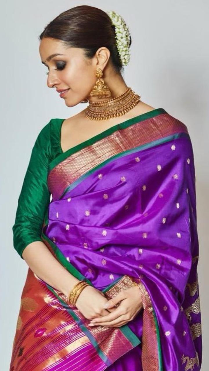 Shraddha Kapoor wore her mother Shivangi Kapoor's purple paithani saree. With her hair done in a neat bun and adorned with gajra, the actress looked breathtakingly beautiful