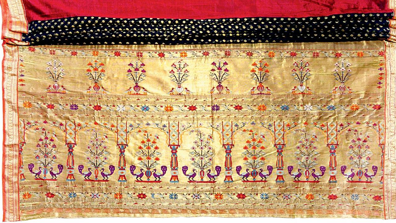 Saree; cotton, mulberry silk, zari (gold); end panel—complementary plain weave (interlocked tapestry); collection  of Nagpur Central Museum. (There are two end panels in this textile. These, the border and the field,  are hand-stitched together. One end panel is of the classic Ilkal variety, possibly woven in present-day Southern  Maharashtra or Northern Karnataka. Inventory notes refer to the textile as a paithani saree of Burhanpur.)