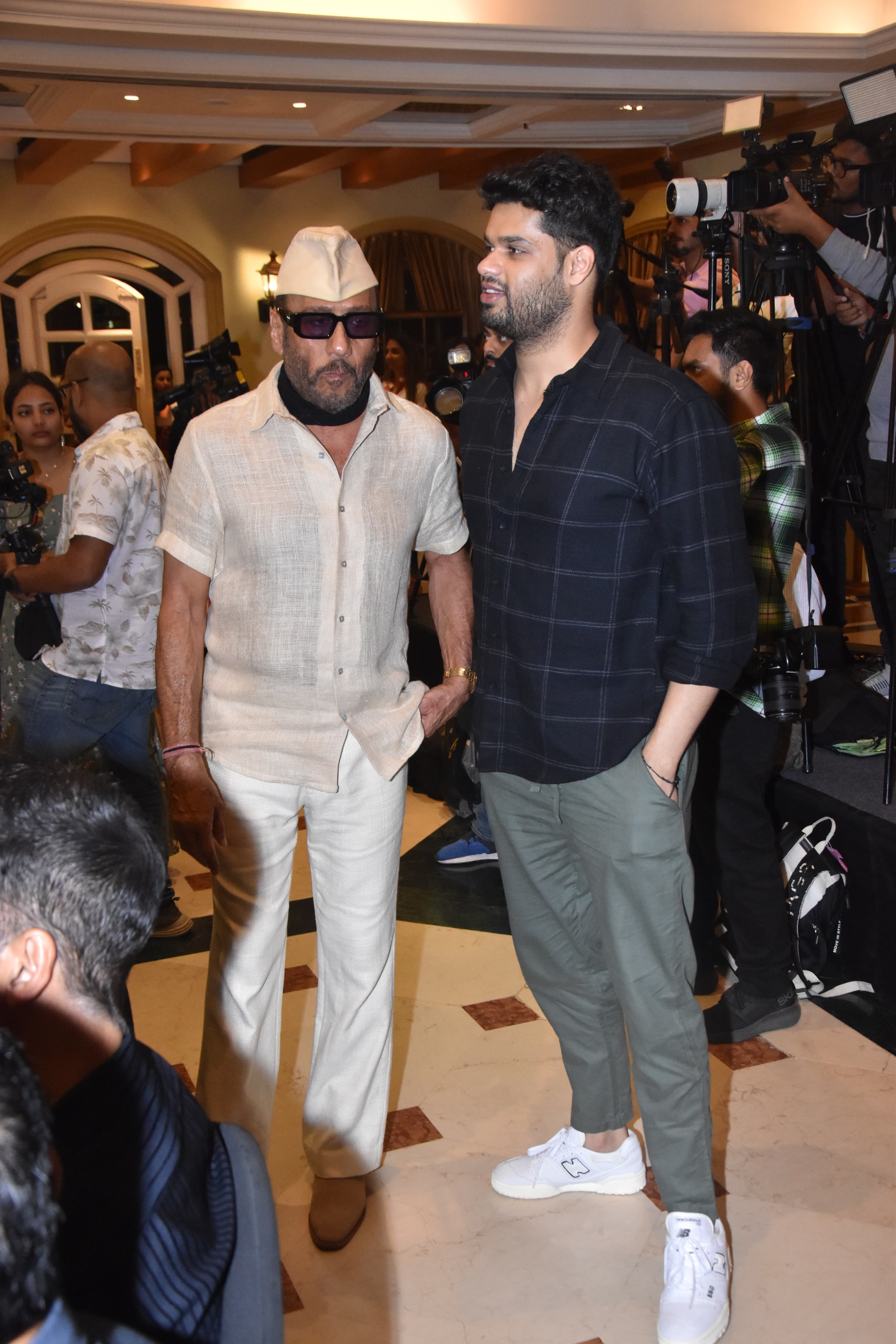 Jackie Shroff looked dapper in his white shirt paired with matching pant and topi