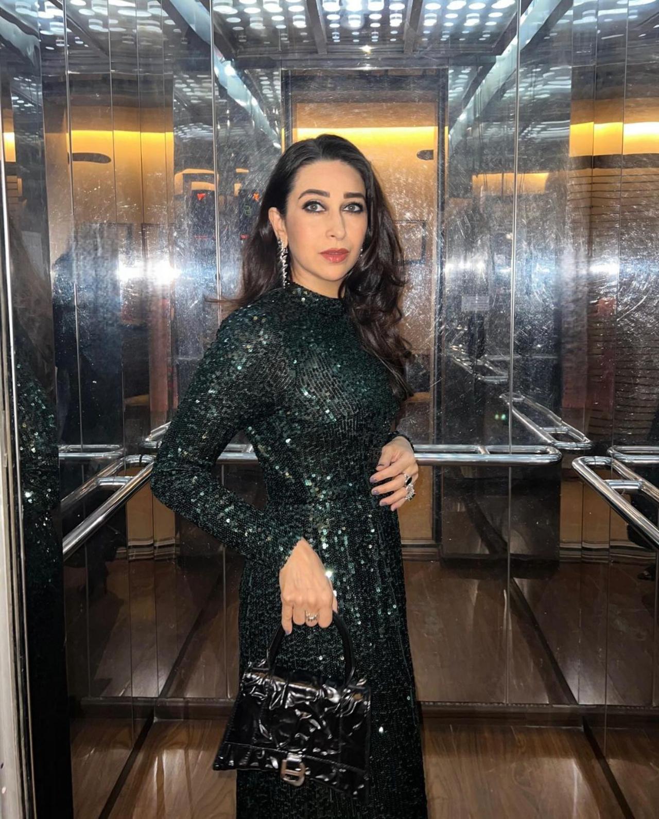 Karisma Kapoor opted for a shimmery green gown to dance the night away at her 'Dil Toh Pagal Hai' co-star's birthday