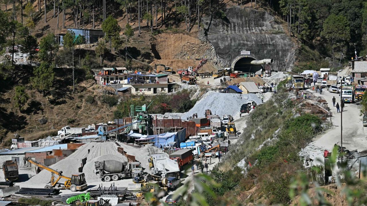 The tunnel collapsed following a landslide early on November 12, leaving 41 workers trapped behind a huge mound of debris