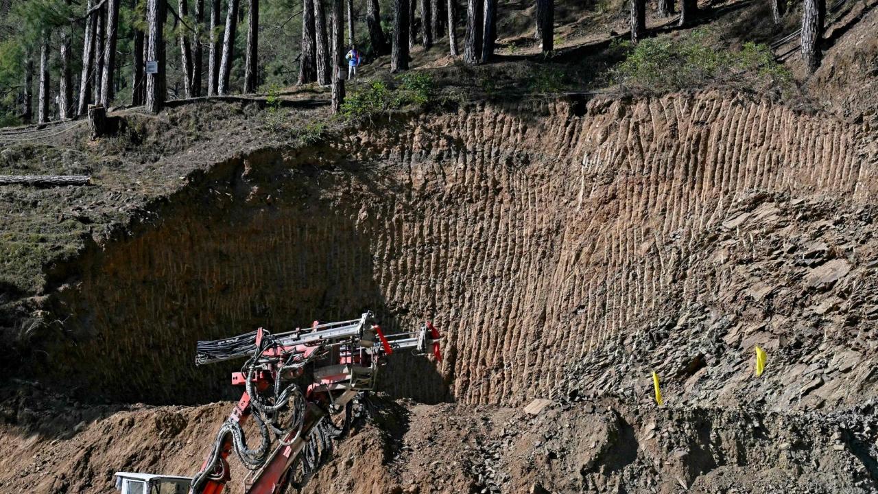 On Friday afternoon, efforts to drill through the debris with a huge auger machine received a setback when it encountered a boulder